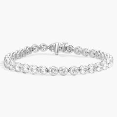 10 CTW Bezel Set Created Moissanite Tennis Bracelet in 14Kt Gold Plated – Round Cut, 7 Inch