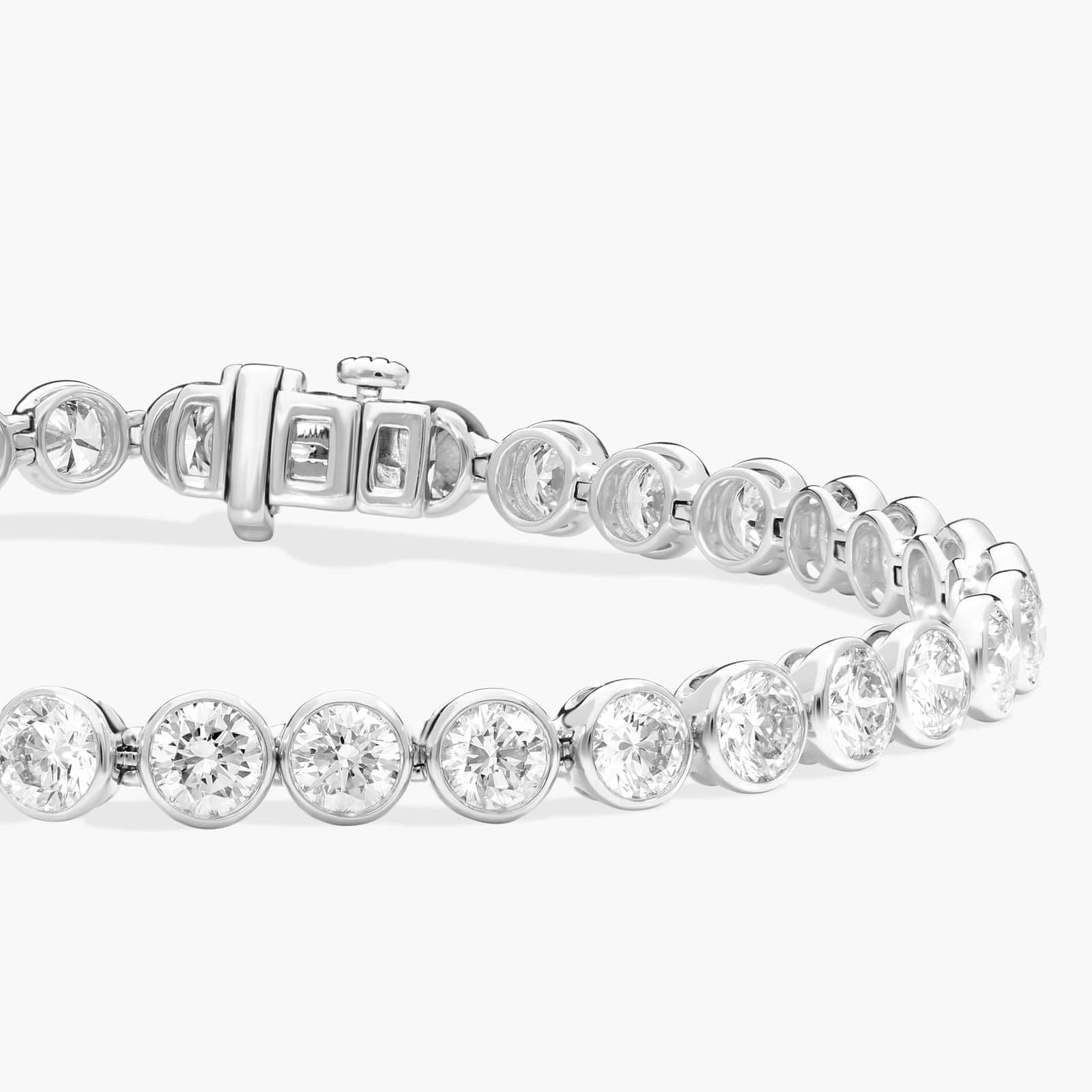 10 CTW Bezel Set Created Moissanite Tennis Bracelet in 14Kt Gold Plated – Round Cut, 7 Inch